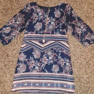 Fancy patterned dress with necklace